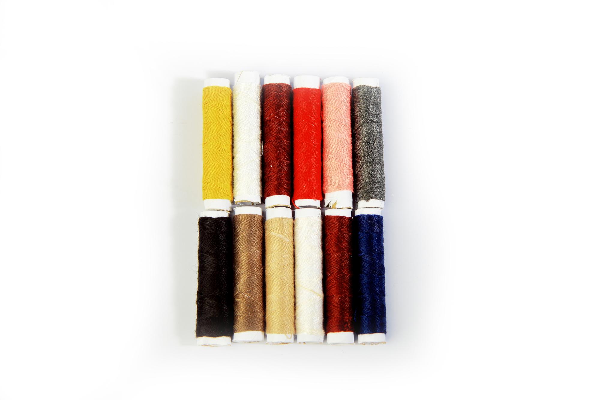 Stack of embroidered sample cards